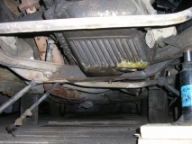 Замазанный холодной сваркой поддон